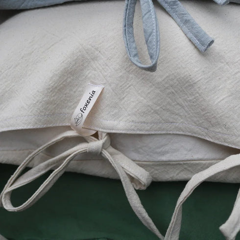 Long cushions with removable covers made of robust cotton house canvas